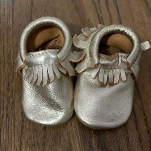 Freshly picked gold moccasins size 2